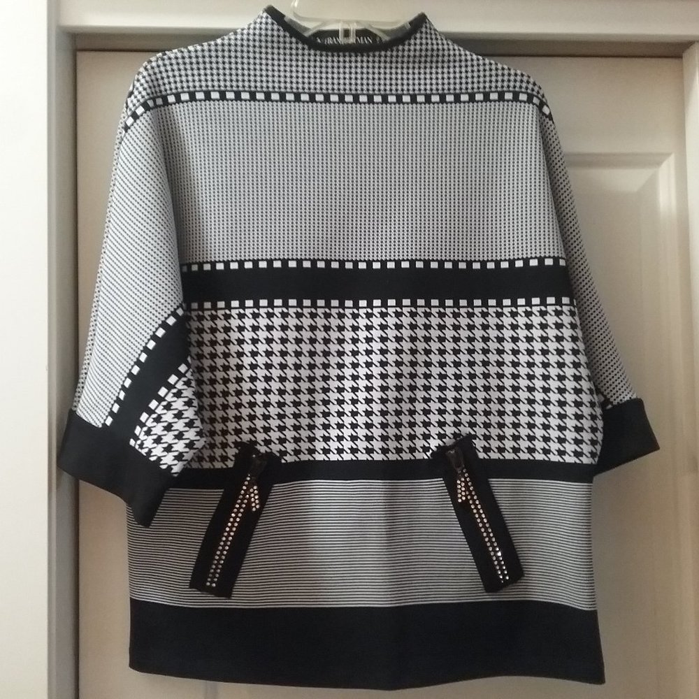 Frank Lyman  top